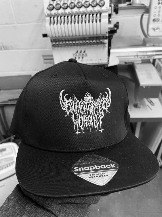 Embrodied black snapback cap with unholy logo