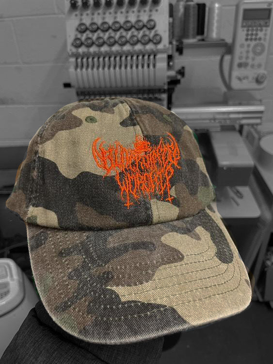 vintage embrodied thrashers camo cap with hunters orange unholy logo