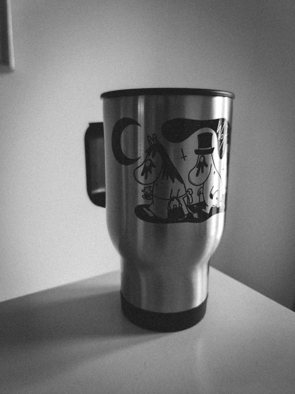 black metal moomin Travel Mug