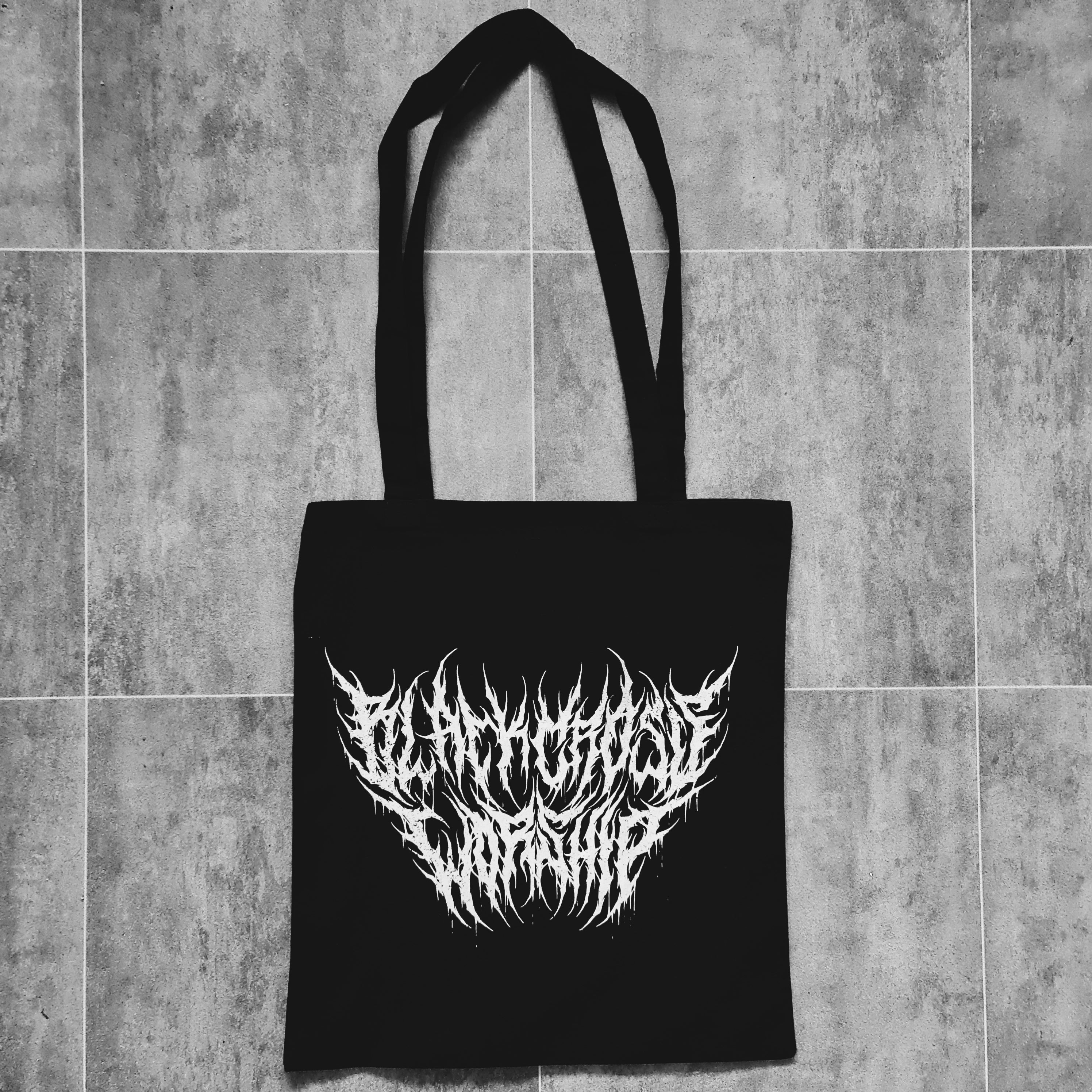 Black cross.worship black tote bag